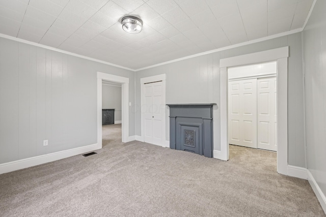 45 S Main St, New Holland, OH 43145 - unfurnished living room with crown molding, carpet, and baseboards