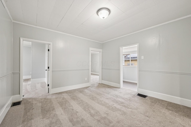 45 S Main St, New Holland, OH 43145 - unfurnished room featuring ornamental molding, carpet floors, and baseboards