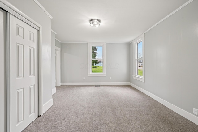 45 S Main St, New Holland, OH 43145 - unfurnished bedroom with carpet flooring, ornamental molding, and baseboards