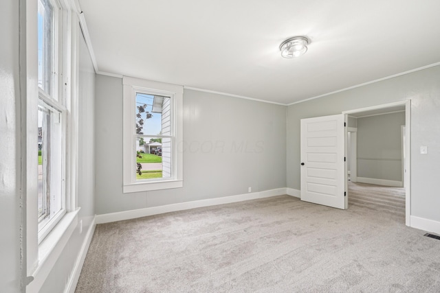 45 S Main St, New Holland, OH 43145 - empty room with carpet, ornamental molding, and baseboards