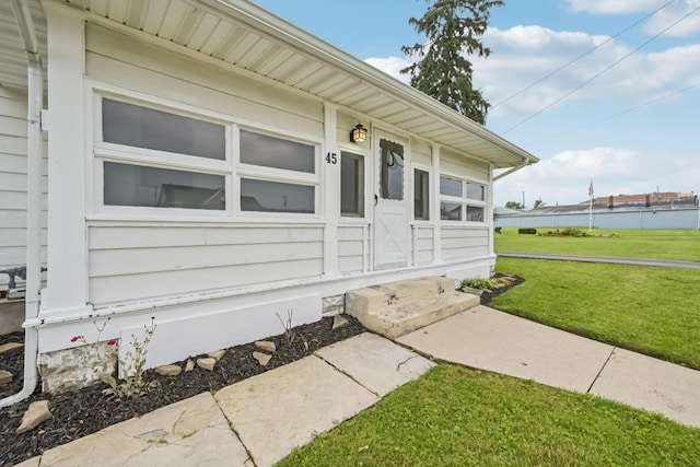 45 S Main St, New Holland, OH 43145 - property entrance with a lawn