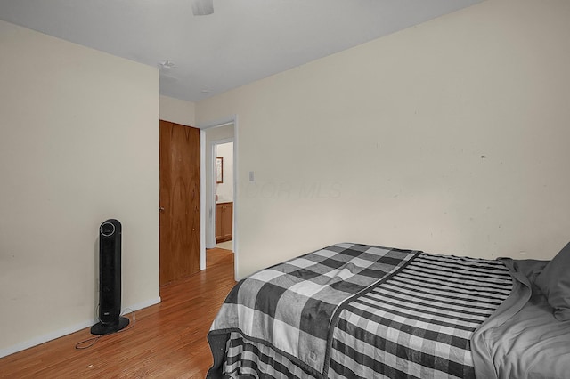 5990 Roselawn Ave, Columbus, OH 43232 - bedroom featuring light wood-type flooring and baseboards