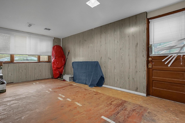 5990 Roselawn Ave, Columbus, OH 43232 - unfurnished room with wood walls and wood finished floors