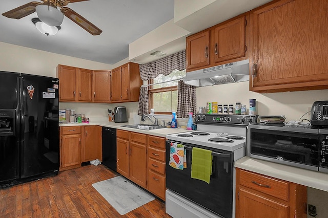 5990 Roselawn Ave, Columbus, OH 43232 - kitchen featuring black appliances, under cabinet range hood, a sink, a ceiling fan, and light countertops