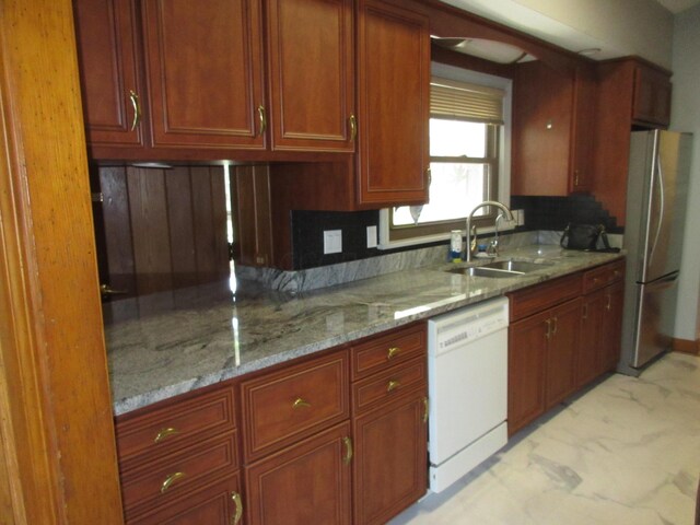 470 Beacon Rd, Newark, OH 43055 - kitchen with dishwasher, a sink, freestanding refrigerator, light marble finish flooring, and light stone counters