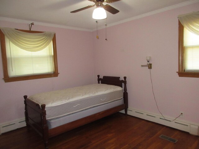 470 Beacon Rd, Newark, OH 43055 - bedroom with baseboard heating, wood finished floors, crown molding, and a ceiling fan