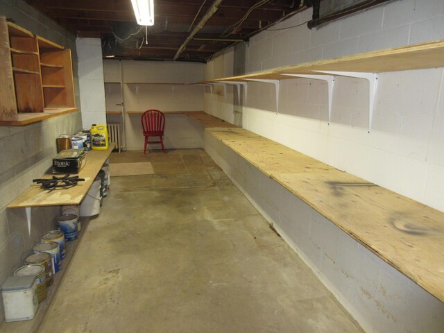 470 Beacon Rd, Newark, OH 43055 - unfinished below grade area featuring concrete block wall and radiator heating unit