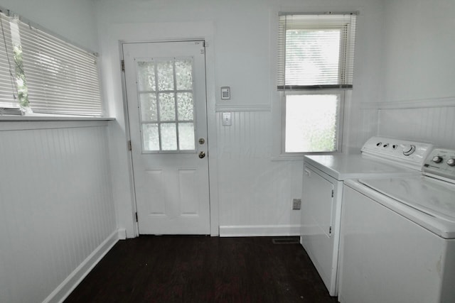 552 Southwood Ave, Columbus, OH 43207 - laundry area with independent washer and dryer, wainscoting, plenty of natural light, dark wood finished floors, and a decorative wall