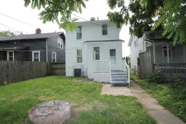 552 Southwood Ave, Columbus, OH 43207 - rear view of house with an outdoor fire pit and a fenced backyard