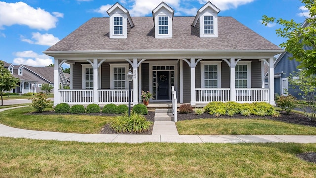 5508 Camlin Pl W Unit 48, Westerville, OH 43081 - view of front facade with a shingled roof, covered porch, and a front yard