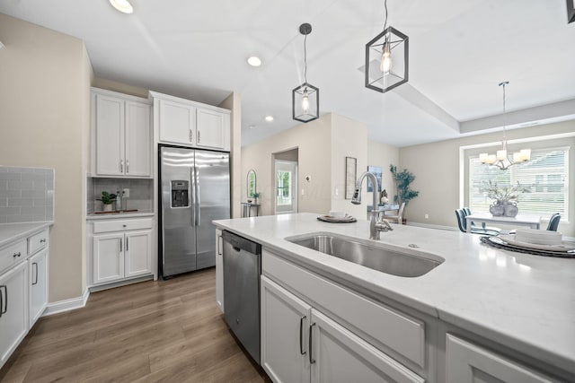 5508 Camlin Pl W Unit 48, Westerville, OH 43081 - kitchen featuring stainless steel appliances, recessed lighting, plenty of natural light, white cabinetry, and backsplash