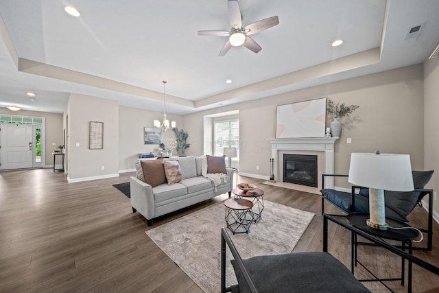 5508 Camlin Pl W Unit 48, Westerville, OH 43081 - living room featuring a tray ceiling, wood finished floors, recessed lighting, a fireplace with flush hearth, and a ceiling fan