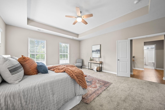 5508 Camlin Pl W Unit 48, Westerville, OH 43081 - carpeted bedroom with a tray ceiling and a ceiling fan