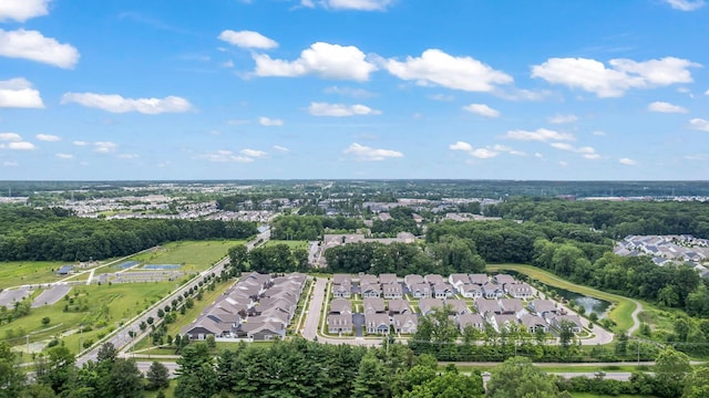 5508 Camlin Pl W Unit 48, Westerville, OH 43081 - aerial view of property and surrounding area featuring nearby suburban area and a tree filled landscape