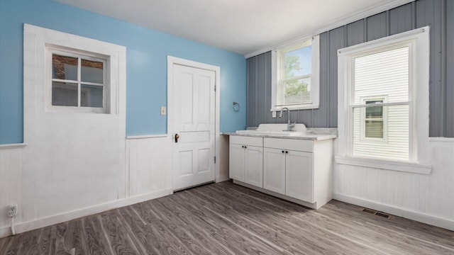 64 W Harrison St, Newark, OH 43055 - washroom featuring wood finished floors and wainscoting