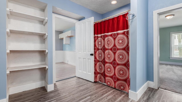 64 W Harrison St, Newark, OH 43055 - entryway with wood finished floors and a textured ceiling