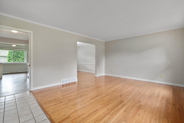 2220 Surreygate Dr, Columbus, OH 43235 - empty room featuring light wood-style flooring and crown molding