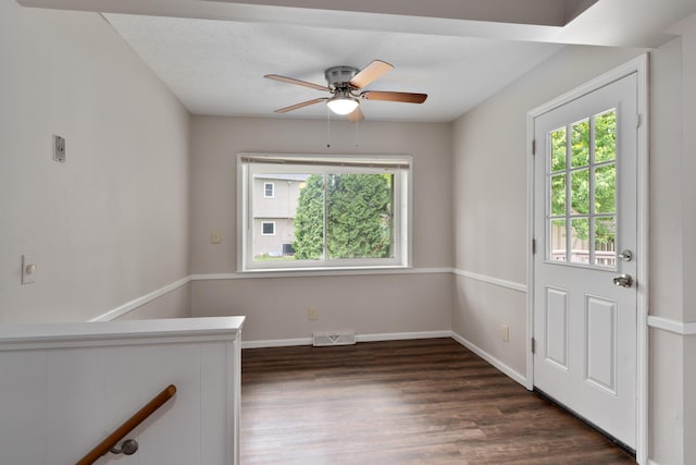 2220 Surreygate Dr, Columbus, OH 43235 - spare room featuring healthy amount of natural light, ceiling fan, and dark wood finished floors