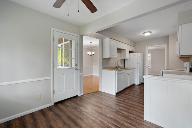 2220 Surreygate Dr, Columbus, OH 43235 - kitchen with white appliances, dark wood-style flooring, ceiling fan, and light countertops