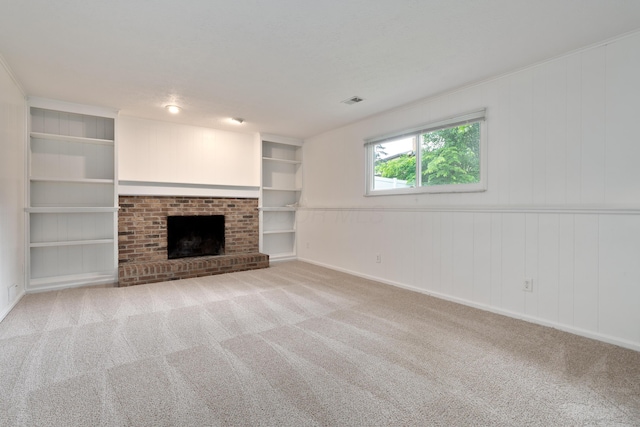 2220 Surreygate Dr, Columbus, OH 43235 - unfurnished living room with carpet floors, a brick fireplace, and built in features