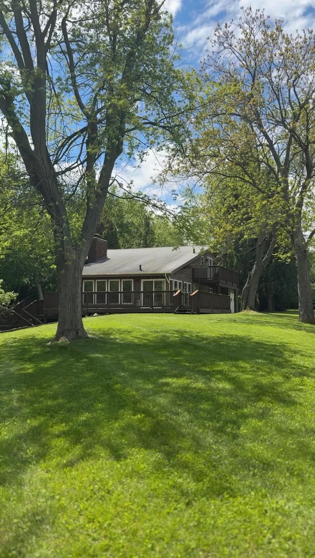 1400 E Choctaw Dr, London, OH 43140 - view of green lawn with a deck