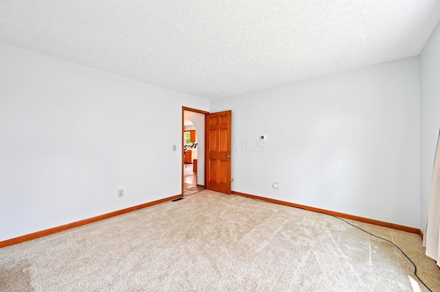 5138 Eastbend Dr, Canal Winchester, OH 43110 - unfurnished room featuring light carpet and a textured ceiling