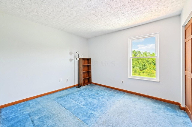 5138 Eastbend Dr, Canal Winchester, OH 43110 - carpeted spare room with baseboards and a textured ceiling