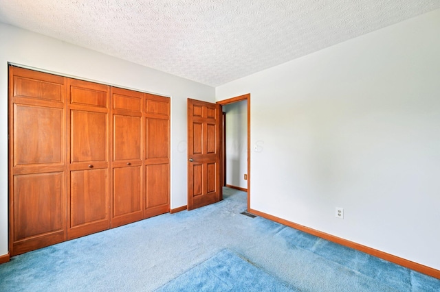 5138 Eastbend Dr, Canal Winchester, OH 43110 - unfurnished bedroom with light carpet, a closet, and a textured ceiling