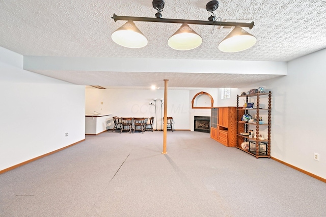 5138 Eastbend Dr, Canal Winchester, OH 43110 - finished below grade area featuring carpet floors, a fireplace, and a textured ceiling