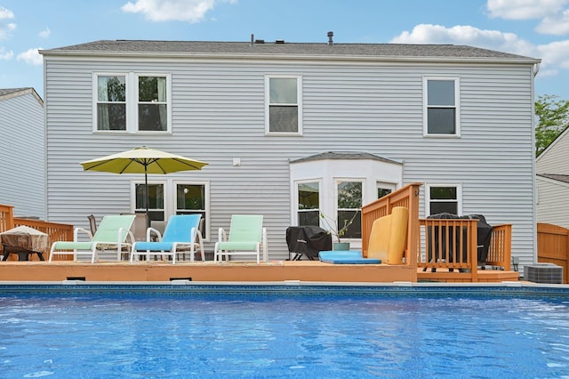 5138 Eastbend Dr, Canal Winchester, OH 43110 - back of house with a deck and an outdoor pool