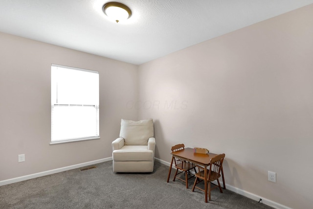 202 Rosewood Loop SW, Commercial Point, OH 43116 - living area with carpet floors and baseboards