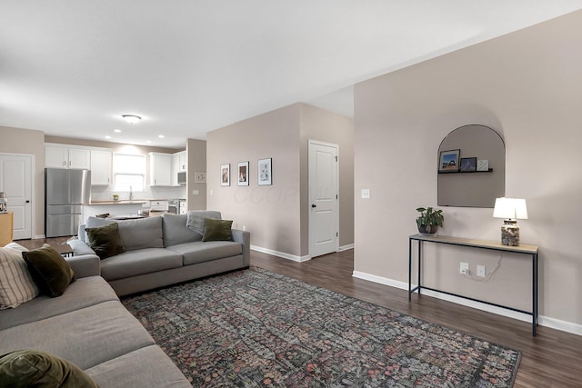 202 Rosewood Loop SW, Commercial Point, OH 43116 - living room with dark wood-type flooring, baseboards, and recessed lighting