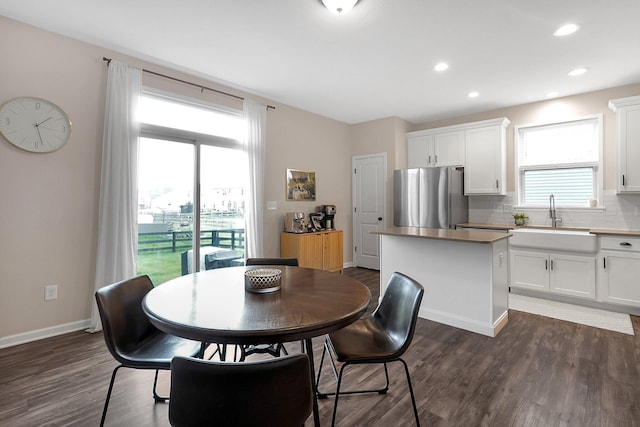 202 Rosewood Loop SW, Commercial Point, OH 43116 - dining area featuring dark wood-type flooring, baseboards, and recessed lighting