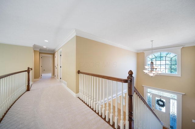 7788 Boylston Ct, Dublin, OH 43016 - hall with a chandelier, an upstairs landing, crown molding, carpet, and recessed lighting