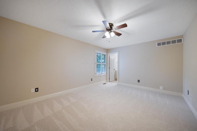 7788 Boylston Ct, Dublin, OH 43016 - unfurnished room with a ceiling fan, light colored carpet, and a textured ceiling