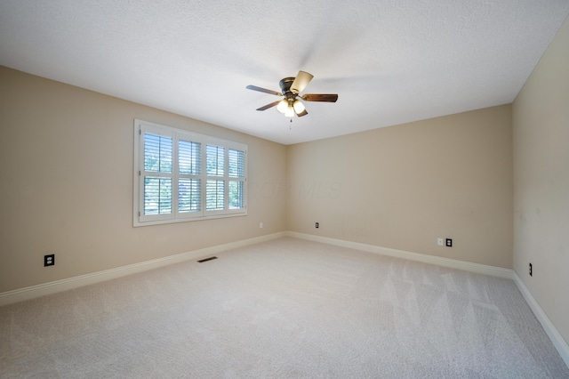 7788 Boylston Ct, Dublin, OH 43016 - empty room with a ceiling fan, light colored carpet, and a textured ceiling