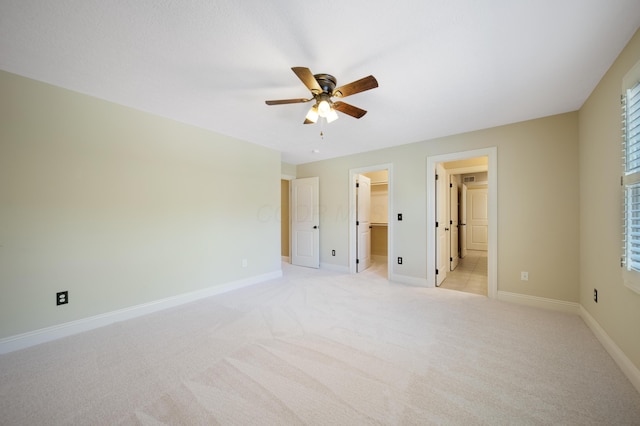 7788 Boylston Ct, Dublin, OH 43016 - unfurnished bedroom featuring a spacious closet, light carpet, ceiling fan, and a closet