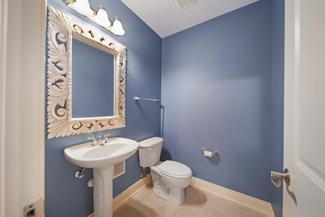 7788 Boylston Ct, Dublin, OH 43016 - half bath featuring toilet and tile patterned flooring