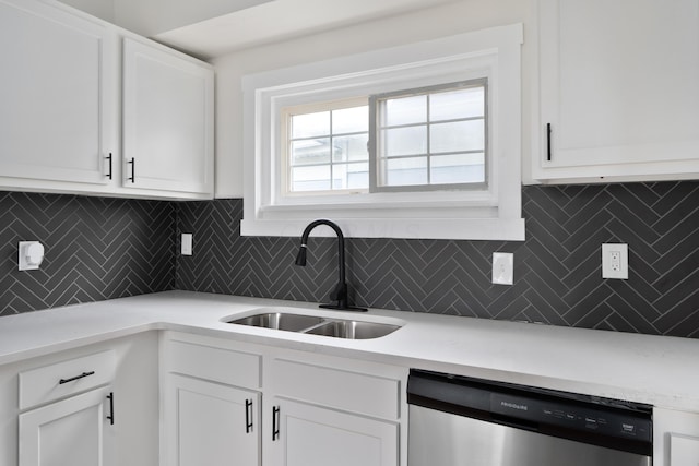 490 E Mithoff St, Columbus, OH 43206 - kitchen with dishwasher, a sink, tasteful backsplash, white cabinetry, and light countertops