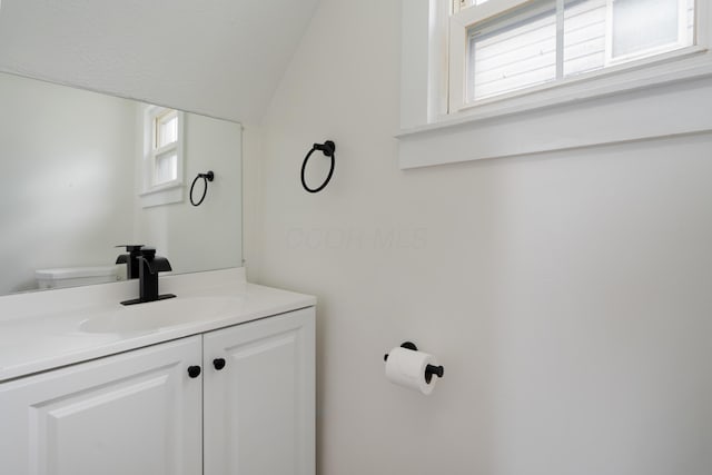490 E Mithoff St, Columbus, OH 43206 - bathroom with vanity and vaulted ceiling