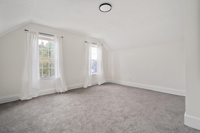 490 E Mithoff St, Columbus, OH 43206 - bonus room featuring lofted ceiling, carpet, and baseboards