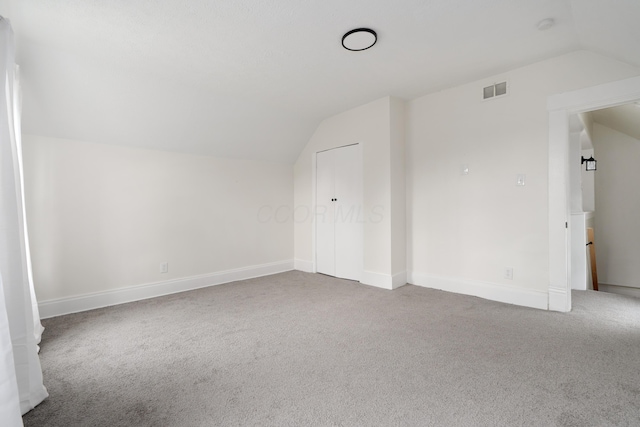 490 E Mithoff St, Columbus, OH 43206 - bonus room featuring lofted ceiling, carpet flooring, and baseboards