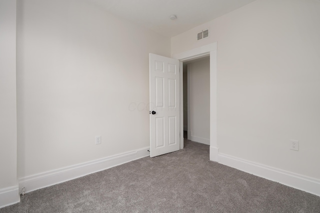 490 E Mithoff St, Columbus, OH 43206 - carpeted empty room featuring baseboards