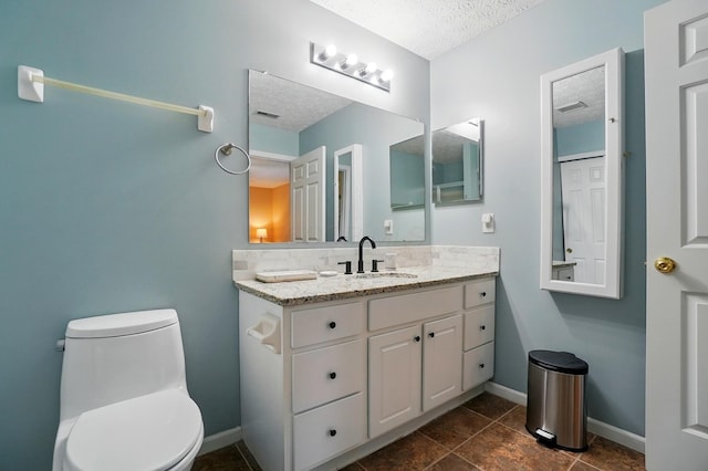 6235 Hampton Green Pl Unit 5B, Dublin, OH 43016 - bathroom featuring a textured ceiling and vanity