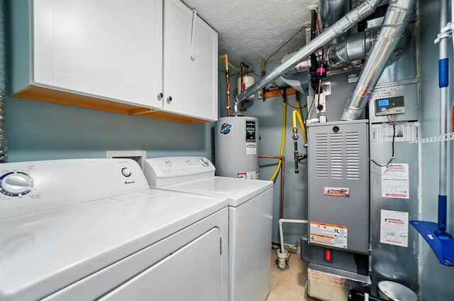 6235 Hampton Green Pl Unit 5B, Dublin, OH 43016 - laundry area featuring separate washer and dryer, cabinet space, water heater, and heating unit
