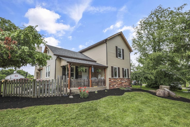1859 State Route 257 N, Ostrander, OH 43061 - rear view of house with a porch, stone siding, and a shingled roof