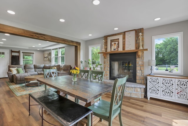 1859 State Route 257 N, Ostrander, OH 43061 - dining space featuring a fireplace, plenty of natural light, wood finished floors, and recessed lighting