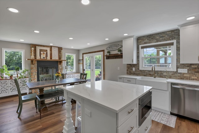 1859 State Route 257 N, Ostrander, OH 43061 - kitchen with appliances with stainless steel finishes, tasteful backsplash, white cabinetry, and recessed lighting