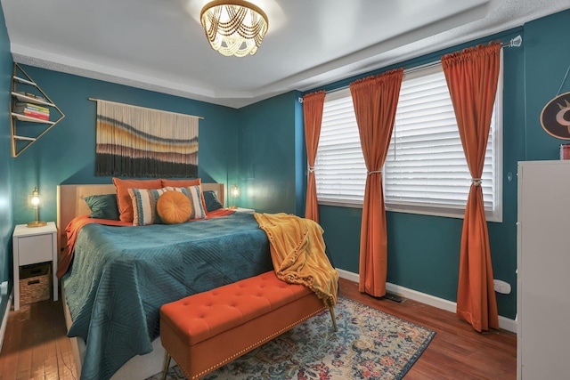 1859 State Route 257 N, Ostrander, OH 43061 - bedroom featuring wood finished floors and multiple windows
