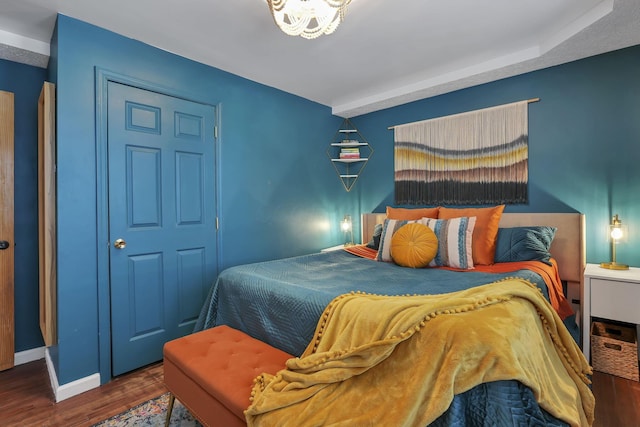 1859 State Route 257 N, Ostrander, OH 43061 - bedroom with wood finished floors and a chandelier